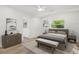 Serene main bedroom featuring a comfortable bed, stylish decor, and ample natural light at 359 55Th Ne Ave, St Petersburg, FL 33703