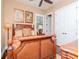 Well-lit bedroom features a wooden bed frame and bedside lamps for a warm ambiance at 4302 W San Pedro St, Tampa, FL 33629