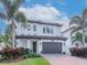 Charming two-story home with a well-manicured lawn and a spacious two-car garage at 4302 W San Pedro St, Tampa, FL 33629