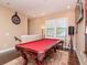 Game room featuring billiard table, large windows, and a wall-mounted TV at 4302 W San Pedro St, Tampa, FL 33629