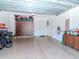 Clean, well-organized two-car garage with epoxy flooring, built-in cabinets, and ample storage space at 4302 W San Pedro St, Tampa, FL 33629