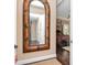 Hallway featuring decorative mirror with views to a bedroom and other rooms at 4302 W San Pedro St, Tampa, FL 33629