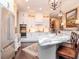 Well-equipped kitchen featuring a marble island, stainless steel appliances, and white cabinetry at 4302 W San Pedro St, Tampa, FL 33629