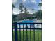 Community pool area with lounge chairs, inviting relaxation and recreation at 4321 Winding River Way, Land O Lakes, FL 34639