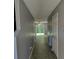 Inviting hallway with new wood flooring leading to the main living area at 4321 Winding River Way, Land O Lakes, FL 34639