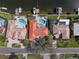 Waterfront property features in-ground pool, private dock, and open water access. Serene waterfront living awaits at 4901 Lansing St Ne, St Petersburg, FL 33703