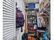 A walk-in closet with shelving provides ample storage space at 4901 Lansing St Ne, St Petersburg, FL 33703