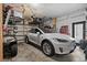 This garage features ample storage and an electric vehicle at 4901 Lansing St Ne, St Petersburg, FL 33703