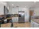 Spacious kitchen featuring stainless steel appliances, granite countertops, and ample cabinet space at 4901 Lansing St Ne, St Petersburg, FL 33703