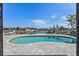 Backyard pool overlooking water and surrounding homes at 4901 Lansing St Ne, St Petersburg, FL 33703