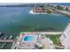 Waterfront view of pool, condos, boats and the bay at 5200 Brittany S Dr # 1710, St Petersburg, FL 33715