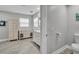 Bathroom with white cabinets, double vanity, and plenty of storage at 541 Ridgecrest Dr, Punta Gorda, FL 33982