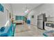 Bedroom suite with beach-themed decor and full kitchenette at 541 Ridgecrest Dr, Punta Gorda, FL 33982