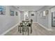 The dining room has an open view of the hallway, kitchen and the adjacent walls at 541 Ridgecrest Dr, Punta Gorda, FL 33982
