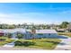 Charming single-story home with a well-maintained lawn and a classic, light gray exterior at 541 Ridgecrest Dr, Punta Gorda, FL 33982