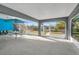 Screened lanai offers a perfect blend of indoor and outdoor living with tile flooring and serene views at 541 Ridgecrest Dr, Punta Gorda, FL 33982