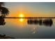 Scenic sunset view reflecting on the tranquil waters, creating a serene and picturesque landscape at 541 Ridgecrest Dr, Punta Gorda, FL 33982