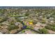 Aerial view of community with mature trees, community lake and assigned parking at 6004 36Th Avenue W Cir # B, Bradenton, FL 34209