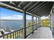 Open-air balcony overlooking the water and a glimpse of the pool below at 72 Adalia Ave, Tampa, FL 33606