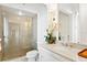 Elegant bathroom with a glass-enclosed shower, modern fixtures, and stylish decor at 72 Adalia Ave, Tampa, FL 33606