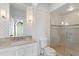 Well-appointed bathroom with granite countertop vanity and a glass-enclosed shower at 72 Adalia Ave, Tampa, FL 33606