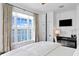 Inviting bedroom featuring a waterfront view, a desk and a serene atmosphere at 72 Adalia Ave, Tampa, FL 33606