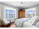 Comfortable bedroom with water view, ceiling fan, hard wood floors and charming decor at 72 Adalia Ave, Tampa, FL 33606