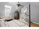 Bedroom with sitting area with stairs leading to another area at 72 Adalia Ave, Tampa, FL 33606