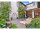 Lush courtyard with fountain and access to a covered outdoor living space at 72 Adalia Ave, Tampa, FL 33606