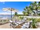 Waterfront patio with comfortable seating and views of the water at 72 Adalia Ave, Tampa, FL 33606