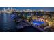 Luxury waterfront estate with private boat docks, pools, and city skyline views, designed for upscale waterfront living at 72 Adalia Ave, Tampa, FL 33606