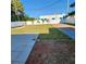 Large grassy fenced back yard with two patios at 8461 5Th N St, St Petersburg, FL 33702