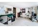 View of a basement featuring a map, Tampa Bay Buccaneers poster, and fitness equipment at 8523 Hamster Dr, Zephyrhills, FL 33540