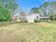 Exterior angle of a one-story home with a covered parking area at 8523 Hamster Dr, Zephyrhills, FL 33540