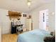 View of the main bedroom with light walls and floors, including a unique chair at 8523 Hamster Dr, Zephyrhills, FL 33540