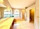 Bright primary bathroom with double sinks, soaking tub, and glass enclosed shower at 9006 Callaway Dr, Trinity, FL 34655