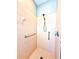 Shower stall featuring soft pink tile and bronze hardware at 9006 Callaway Dr, Trinity, FL 34655