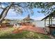 Waterfront property featuring a private dock with covered boat lift and bar area, great for outdoor enjoyment at 9920 Alavista Dr, Gibsonton, FL 33534