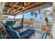 Relaxing outdoor deck with lake view, lounge chairs, and inviting seating area at 9920 Alavista Dr, Gibsonton, FL 33534