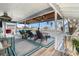 Spacious covered outdoor deck overlooking the water, perfect for entertaining and relaxing at 9920 Alavista Dr, Gibsonton, FL 33534