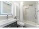 Bright bathroom features a vanity, walk-in shower, and modern finishes at 10064 82Nd St, Seminole, FL 33777