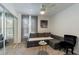 Bedroom with a gray sofa, mirrored closet, and neutral decor at 10064 82Nd St, Seminole, FL 33777