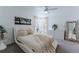 Bright bedroom with white platform bed, and neutral accents at 10064 82Nd St, Seminole, FL 33777