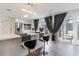Modern kitchen with a breakfast bar, stainless steel appliances, and ample cabinet space at 10064 82Nd St, Seminole, FL 33777