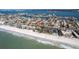 Aerial view of home close to beach with ocean views at 102 23Rd St, Belleair Beach, FL 33786