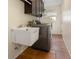 Functional laundry room featuring new washer and dryer with lots of light at 102 23Rd St, Belleair Beach, FL 33786