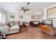 Spacious living room with tile flooring and a comfortable seating area at 102 23Rd St, Belleair Beach, FL 33786