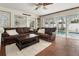 Living room features pool views through sliding glass doors at 102 23Rd St, Belleair Beach, FL 33786