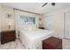 Bright bedroom featuring neutral tones, hardwood flooring, and natural light at 102 23Rd St, Belleair Beach, FL 33786