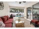 Enclosed patio overlooks the pool and backyard at 102 23Rd St, Belleair Beach, FL 33786